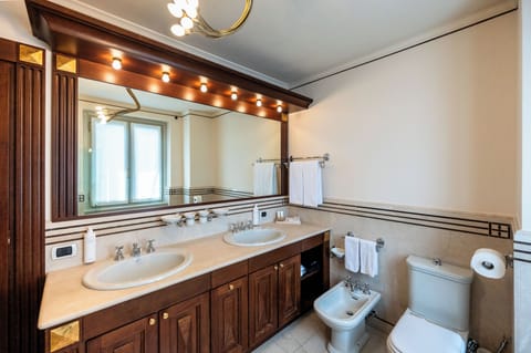 Superior Room | Bathroom | Hair dryer, slippers, towels, soap