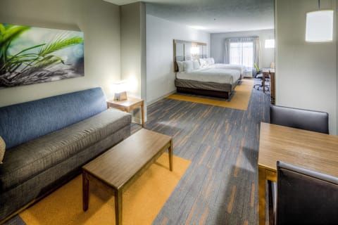 Suite, 2 Queen Beds | In-room safe, desk, iron/ironing board, free cribs/infant beds