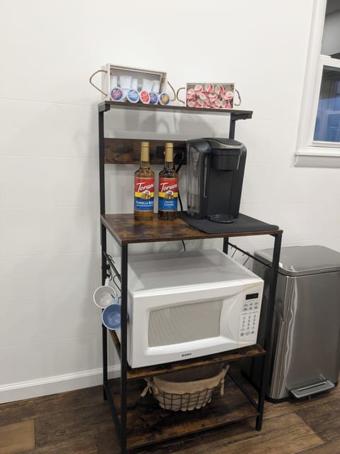 Coffee Station (Keurig)
-complete with cream and flavorings.