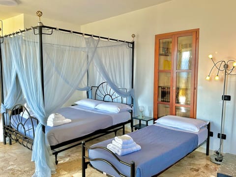 Deluxe Triple Room, Balcony, Sea View | Soundproofing, free WiFi