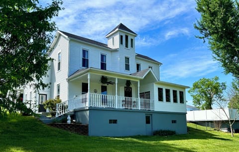 2.1 acres to roam with beautiful front and back porches to enjoy.