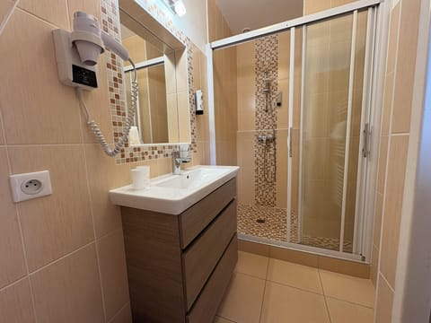 Eco-friendly toiletries, hair dryer, towels, soap