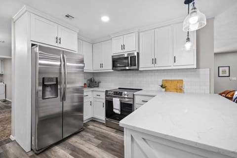 Fully stocked kitchen for all your cooking & baking needs!