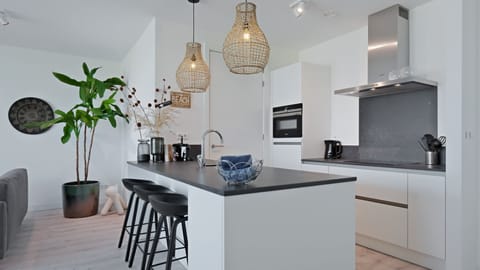 Apartment (Pharos Dunes) | Private kitchen | Fridge, dishwasher, cookware/dishes/utensils