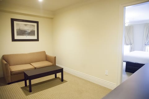 Riverview Suite | Living area | Flat-screen TV