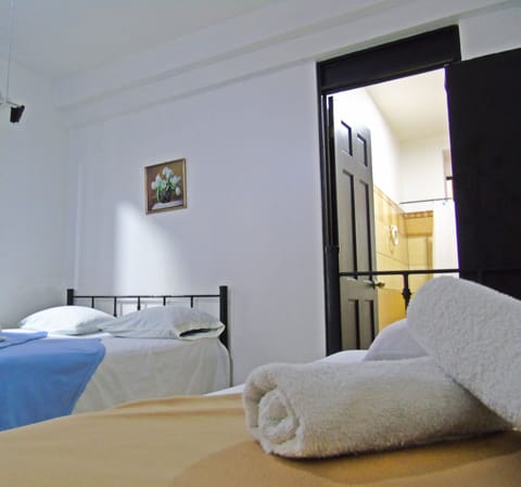 Standard Double Room, Multiple Beds | Iron/ironing board, free WiFi, bed sheets