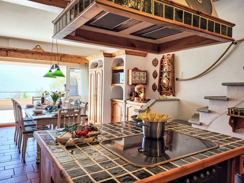 Wood, Kitchen, Interior Design, Furniture, Flooring, Ceiling, Countertop, Floor, Room, Home