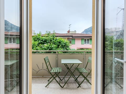 Balcony, Chair, Houseplant, Wood Stain, Porch, Eco Hotel, Outdoor Furniture, Kitchen & Dining Room Table, Outdoor Table, Home Door