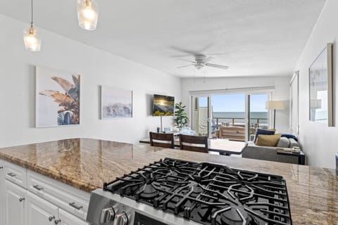 Open kitchen with ocean views, perfect for cooking and entertaining.