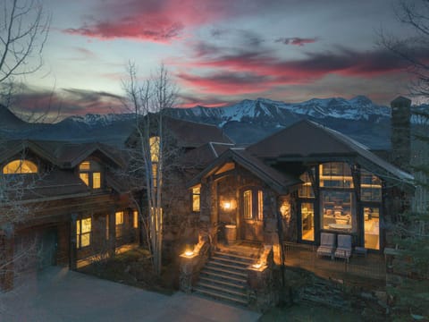 Exterior: On-site parking for 7 vehicles (2 in garage, 5 in driveway)