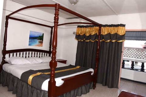 Room, 1 King Bed | 1 bedroom, in-room safe, individually decorated, individually furnished