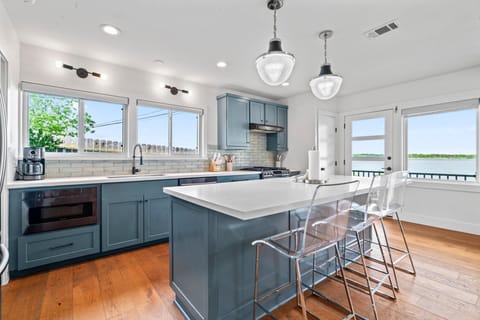 Beautifully updated kitchen with additional seating at the island bar.