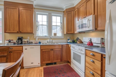 The kitchen is fully stocked for your cooking necessities. 