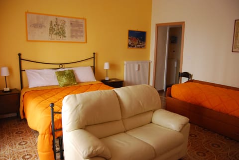 Comfort Room, 1 Queen Bed, City View | In-room safe, individually decorated, iron/ironing board, free WiFi