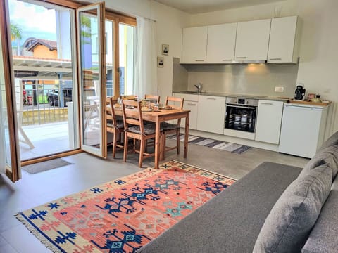 Flooring, Floor, Furniture, Interior Design, Wood, Wood Flooring, Room, Table, Ceiling, Apartment