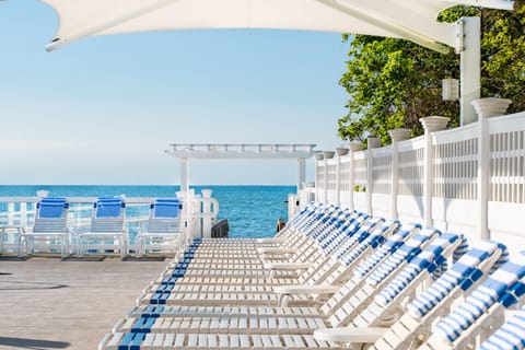 Seasonal outdoor pool, cabanas (surcharge), pool umbrellas