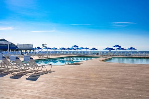 Seasonal outdoor pool, cabanas (surcharge), pool umbrellas