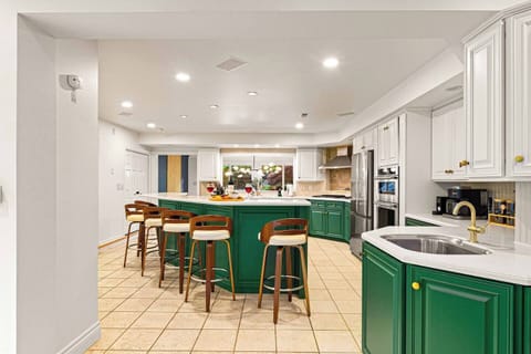 Sleek bar seating meets gourmet design—perfect for casual dining, entertaining, or morning coffee.