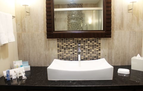 King Suite, Room | Bathroom | Shower, free toiletries, hair dryer, towels