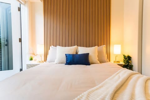 Drift into a restful sleep on a top-rated memory foam queen bed, wrapped in soft linens and blackout blinds for the perfect night’s rest. Your peaceful sanctuary awaits!