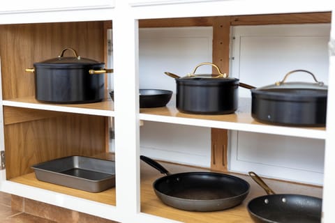  Fully stocked kitchen with pots and pans provide