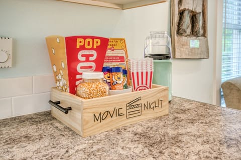 Movie night essentials: air-popped popcorn and a flavor bar to make it your own.