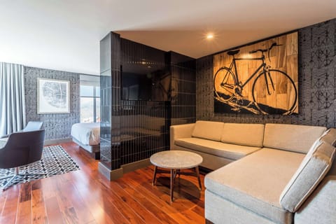 Suite, 1 King Bed (Groom) | Living area | 42-inch TV with cable channels, MP3 dock