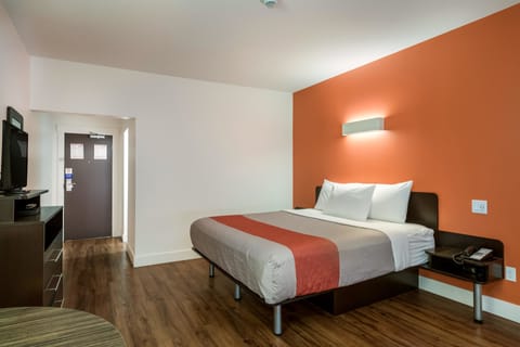 Deluxe Room, 1 King Bed, Non Smoking, Refrigerator | Iron/ironing board, free WiFi, bed sheets