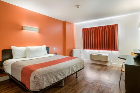 Deluxe Room, 1 King Bed, Non Smoking, Refrigerator | Iron/ironing board, free WiFi, bed sheets