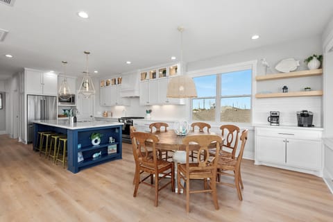 Bright dining area with Gulf views. Perfect for meals and morning coffee.