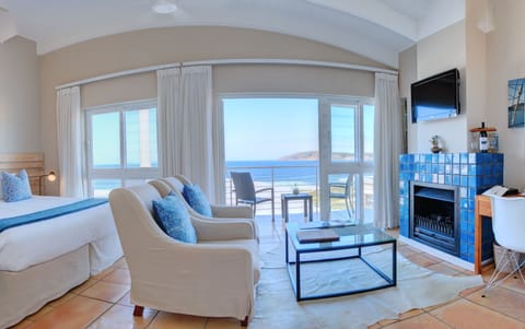 Superior Double Room, 1 Bedroom, Beach View | Living area | Flat-screen TV, MP3 dock