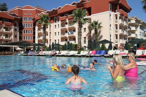 Outdoor pool, open 8 AM to 7 PM, pool umbrellas, sun loungers