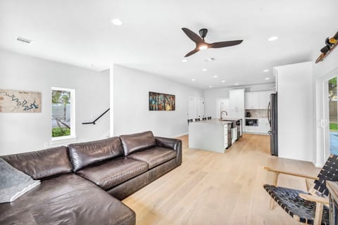 open concept modern living and kitchen area perfect for entertaining