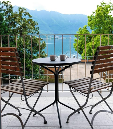 Apartment, 1 Bedroom, Balcony, Lake View | Outdoor dining