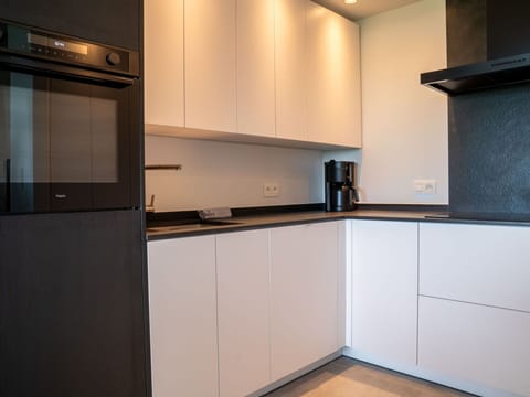 Kitchen, Interior Design, Flooring, Kitchen Appliance, Wood, Countertop, Cabinetry, Floor, Major Appliance, Ceiling