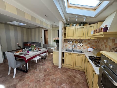 Furniture, Interior Design, Flooring, Kitchen, Floor, Wood, Countertop, Ceiling, Lighting, Room