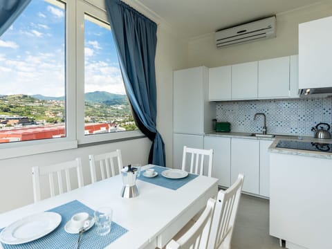 Furniture, Chair, Table, Outdoor Furniture, Outdoor Table, Porch, Kitchen & Dining Room Table, Balcony, Deck, Shade