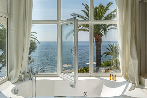 Suite, Jetted Tub, Sea View (Prestige) | Bathroom | Designer toiletries, hair dryer, bathrobes, slippers