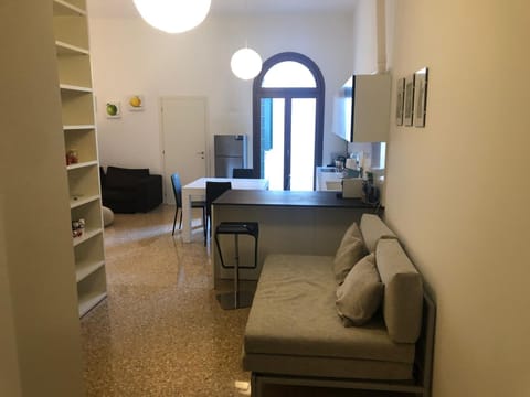 Apartment, Garden View | Living area | Flat-screen TV