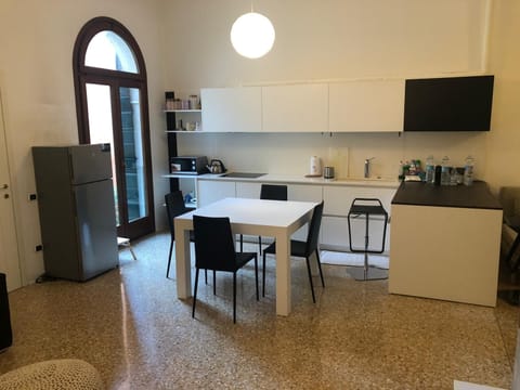 Apartment, Garden View | Living area | Flat-screen TV