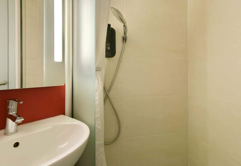 Shower, towels, soap, toilet paper