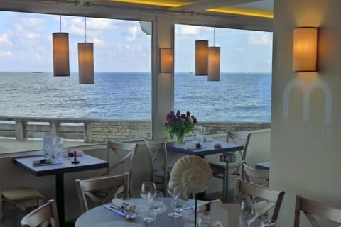 Lunch and dinner served, local cuisine