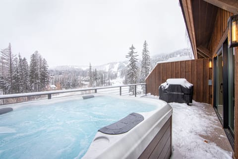 Relax together in the home's private hot tub with slope side views | Exterior