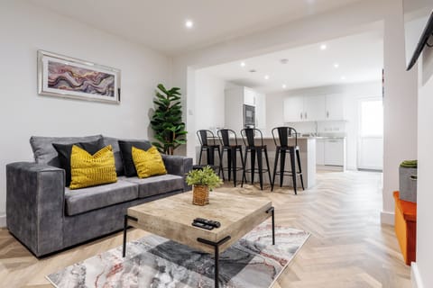 Comfortable Living Space featuring:
-1 large open-plan lounge/kitchen/dining area
-Lounge area near the front window, perfect for natural light and relaxing
-Smart TV with Netflix
-1 x small sofa bed