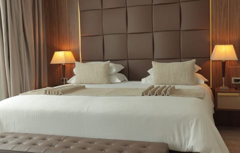 Signature Suite | Egyptian cotton sheets, premium bedding, minibar, in-room safe