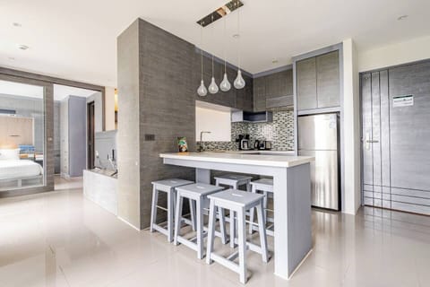 Apartment | Private kitchen | Full-size fridge, microwave, stovetop, electric kettle