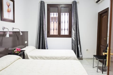 Double or Twin Room, Private Bathroom | Desk, free WiFi, bed sheets