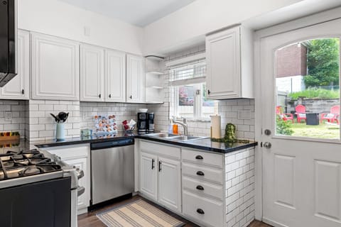 The kitchen area has direct access to the outdoor area