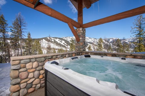 Relax and take in the mountain views from the oversized private hot tub | Exterior