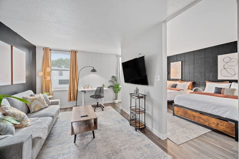 Comfortable living space with ample lighting , mini bar and smart TV!